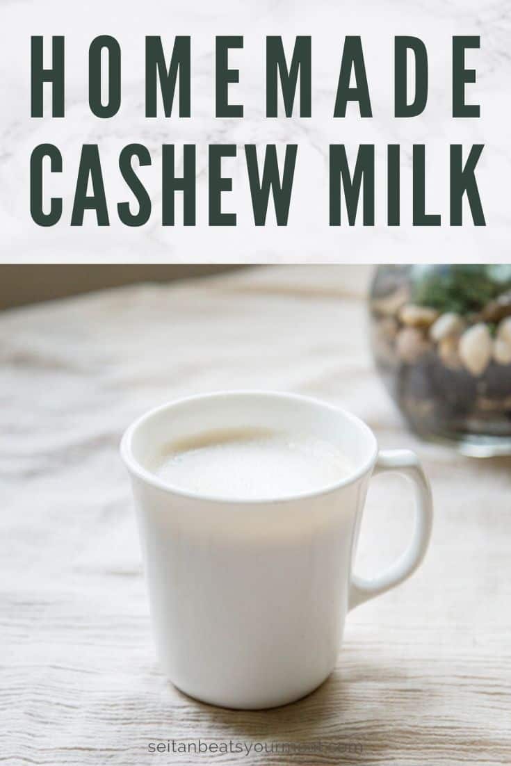 Mug of cashew milk on cream tablecloth