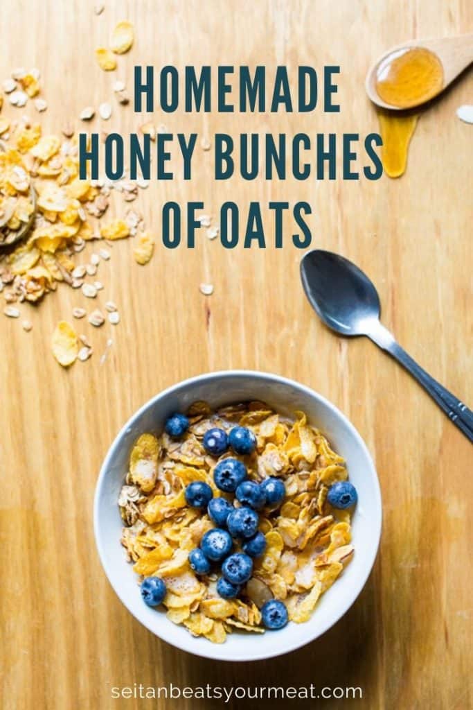 Bowl of vegan Honey Bunches of Oats cereal in bowl with blueberries on a wooden counter
