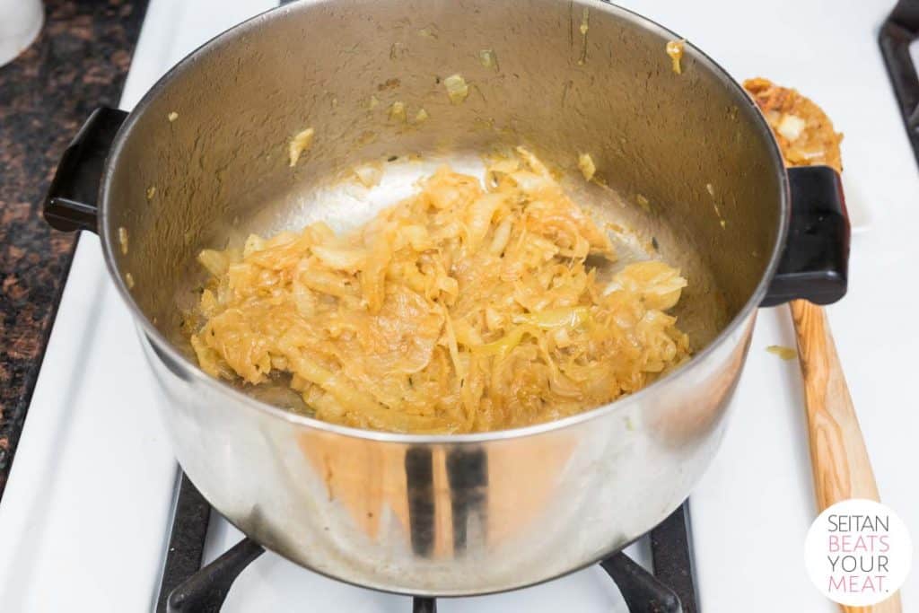 Brown caramelized onions in pot on stove
