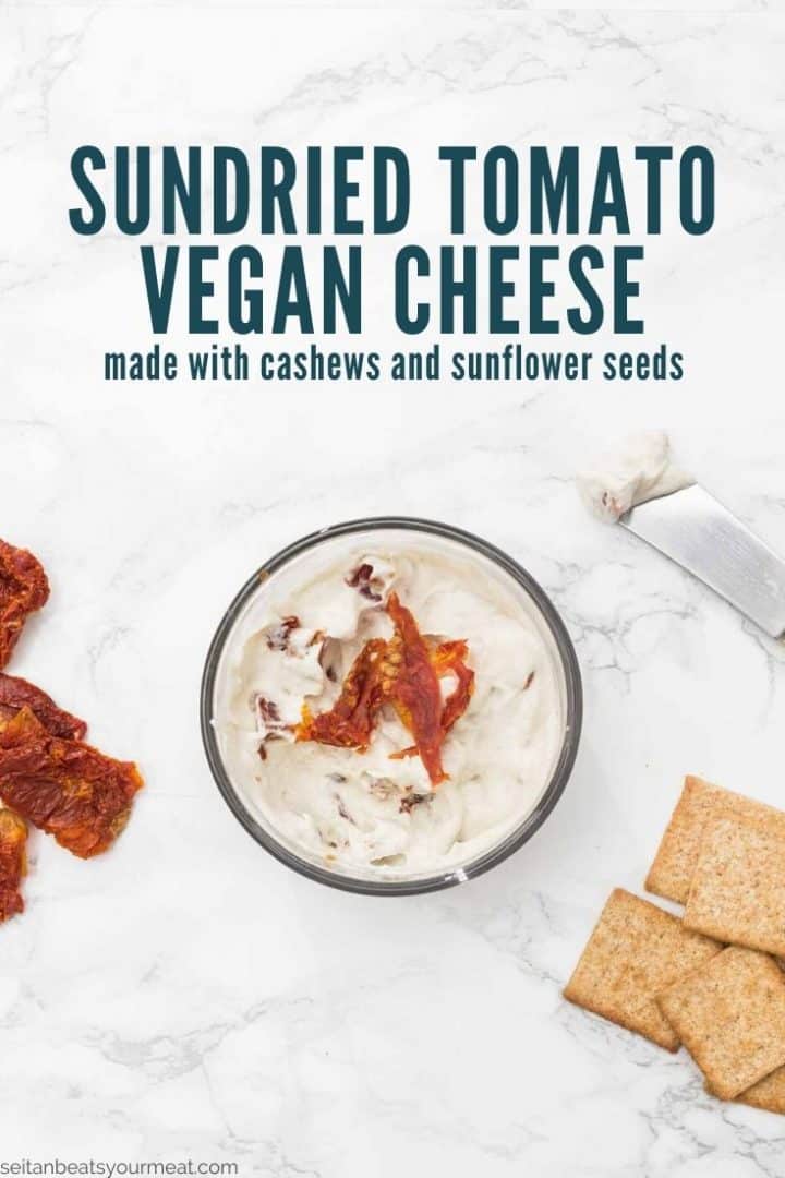 Text on photo "Sundried Tomato Vegan Cheese made with cashews and sunflower seeds" with bowl of cheese and crackers