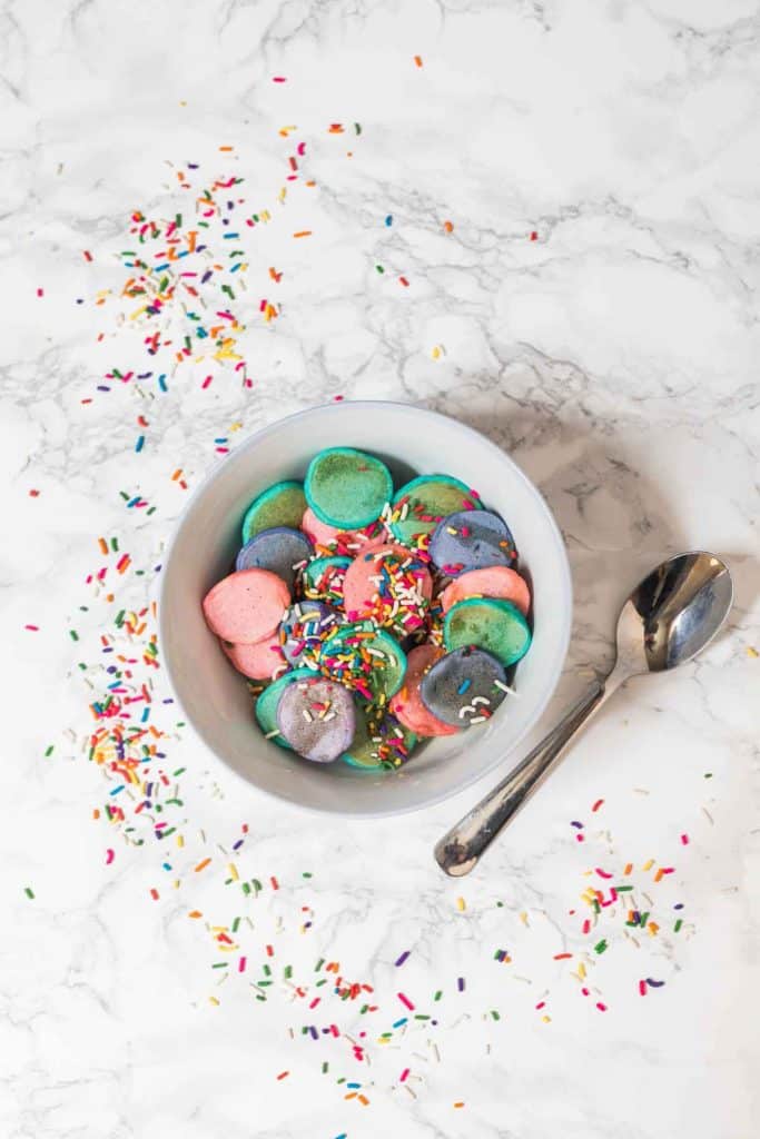 Colorful pancake cereal (small pancakes in bowl) with sprinkles
