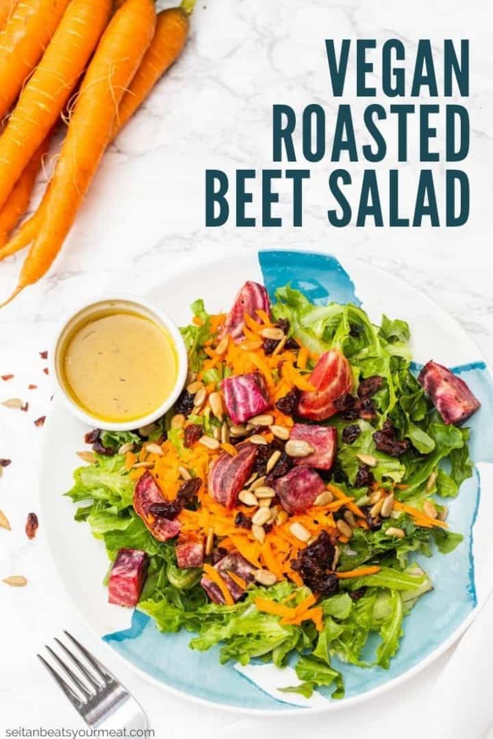Plated salad with dressing and veggies with text "Vegan Roasted Beet Salad"
