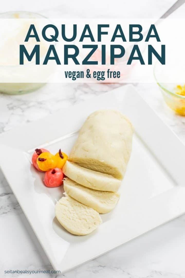 Sliced log of marzipan on plate with colorful marzipan fruit with text "Aquafaba Marzipan"