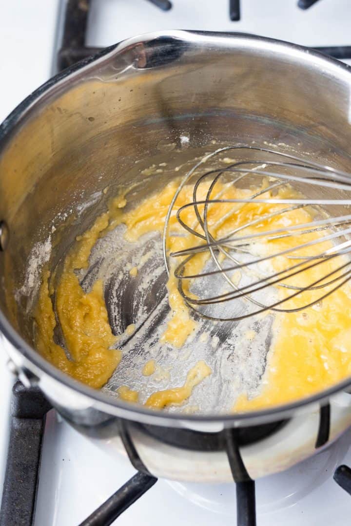 Roux in saucepan with whisk