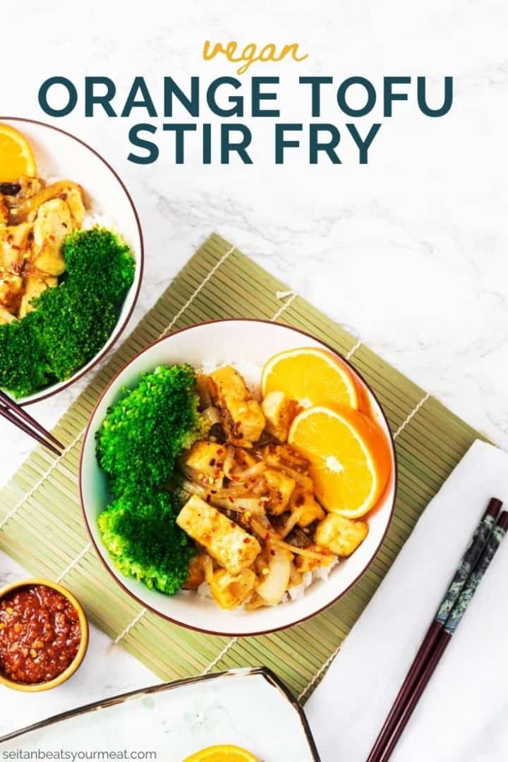 Bowl of orange tofu with broccoli with text "Vegan Orange Tofu Stir Fry"