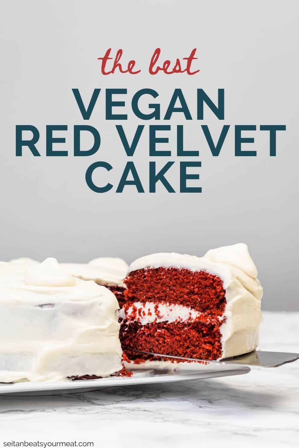Slice of red velvet cake being lifted out of cake on plate with a cake server with text "The Best Vegan Red Velvet Cake"