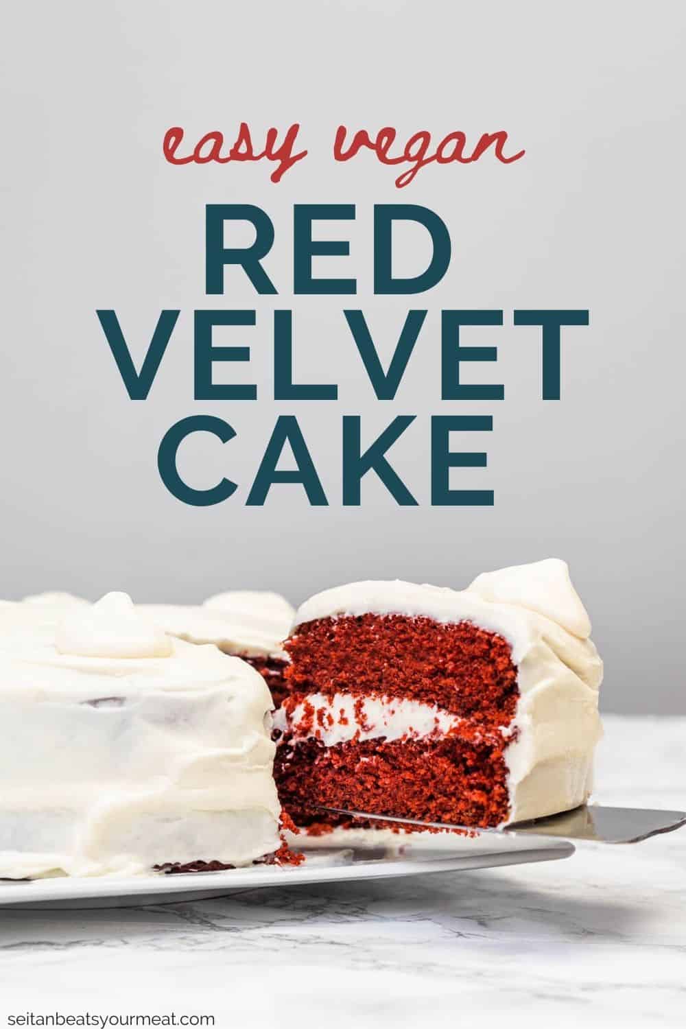 Slice of red velvet cake being lifted out of cake on plate with a cake server with text "Easy Vegan Red Velvet Cake"