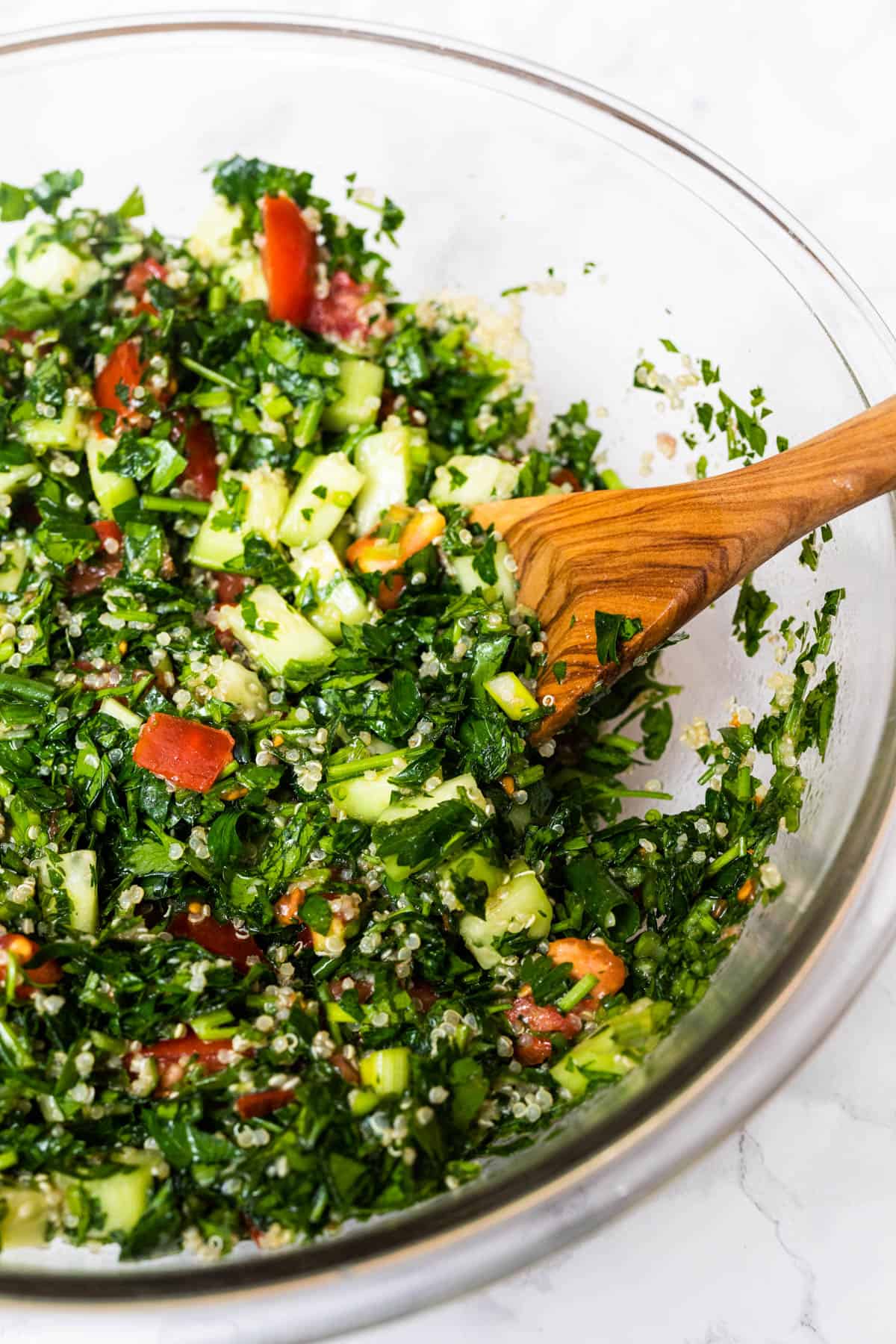 Large salad bowl filled with quinoa tabouli